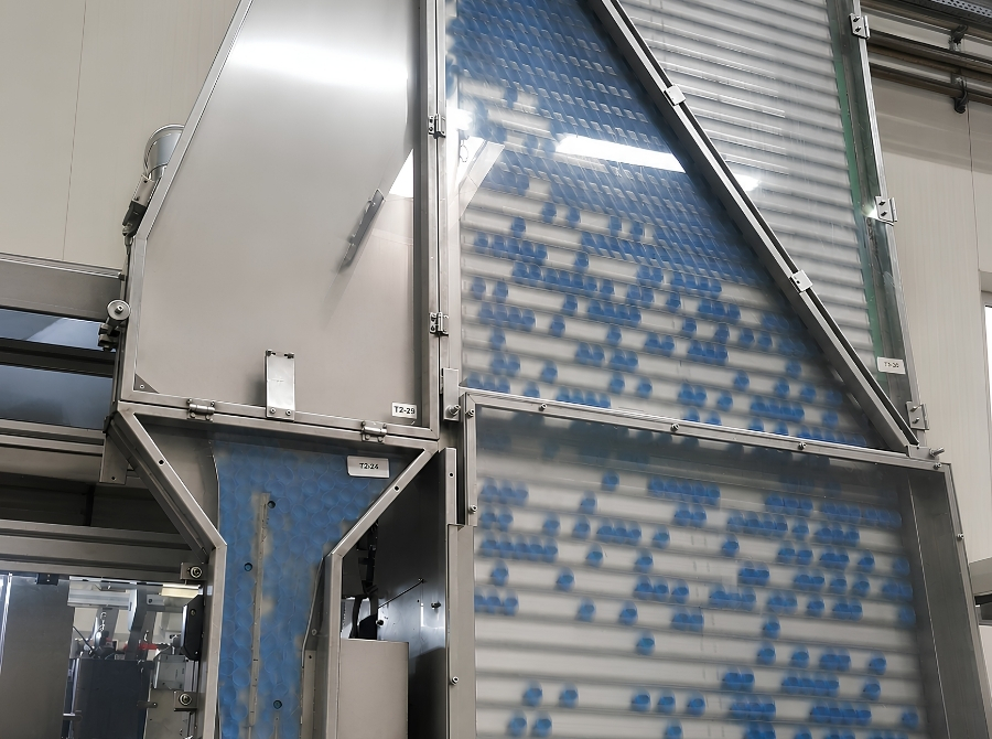 Cap Orienting Elevator